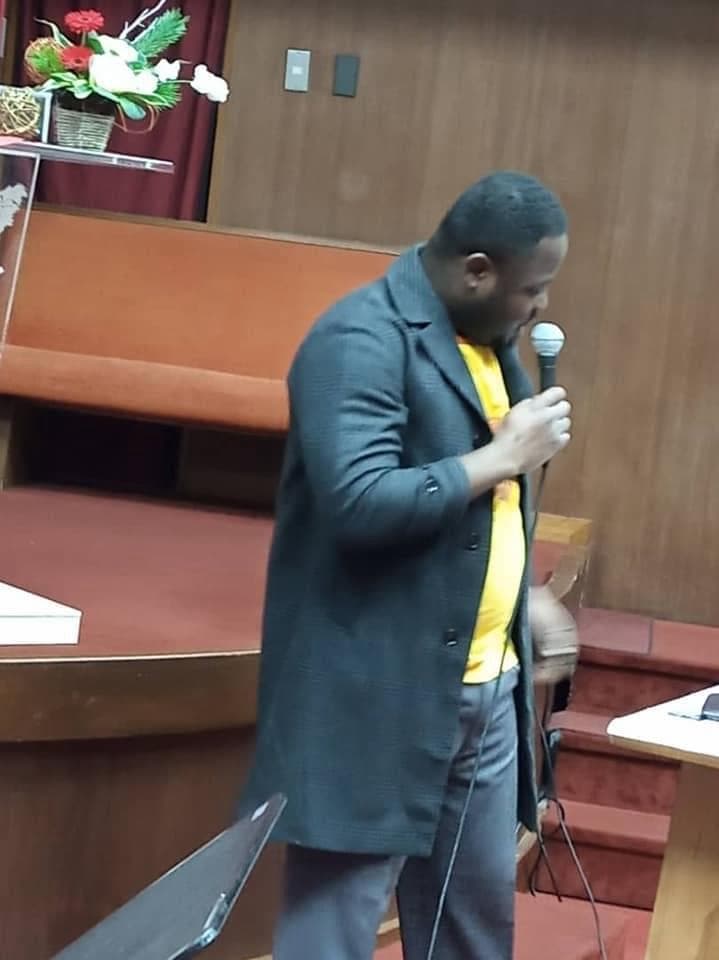 Rev. Courage Tengey ministering at a church in Ghana